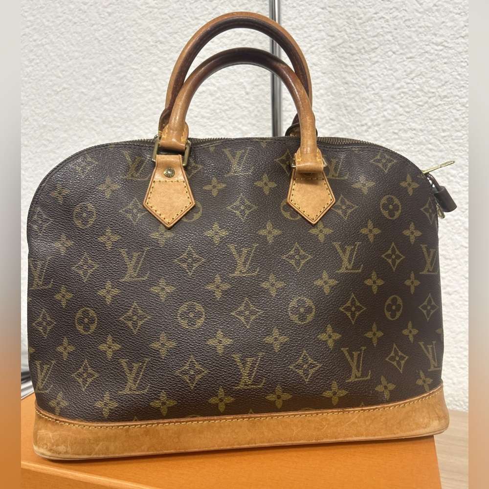 Louis Vuitton Monogram Alma Satchel in Brown and Tan - Picture 1 of 8